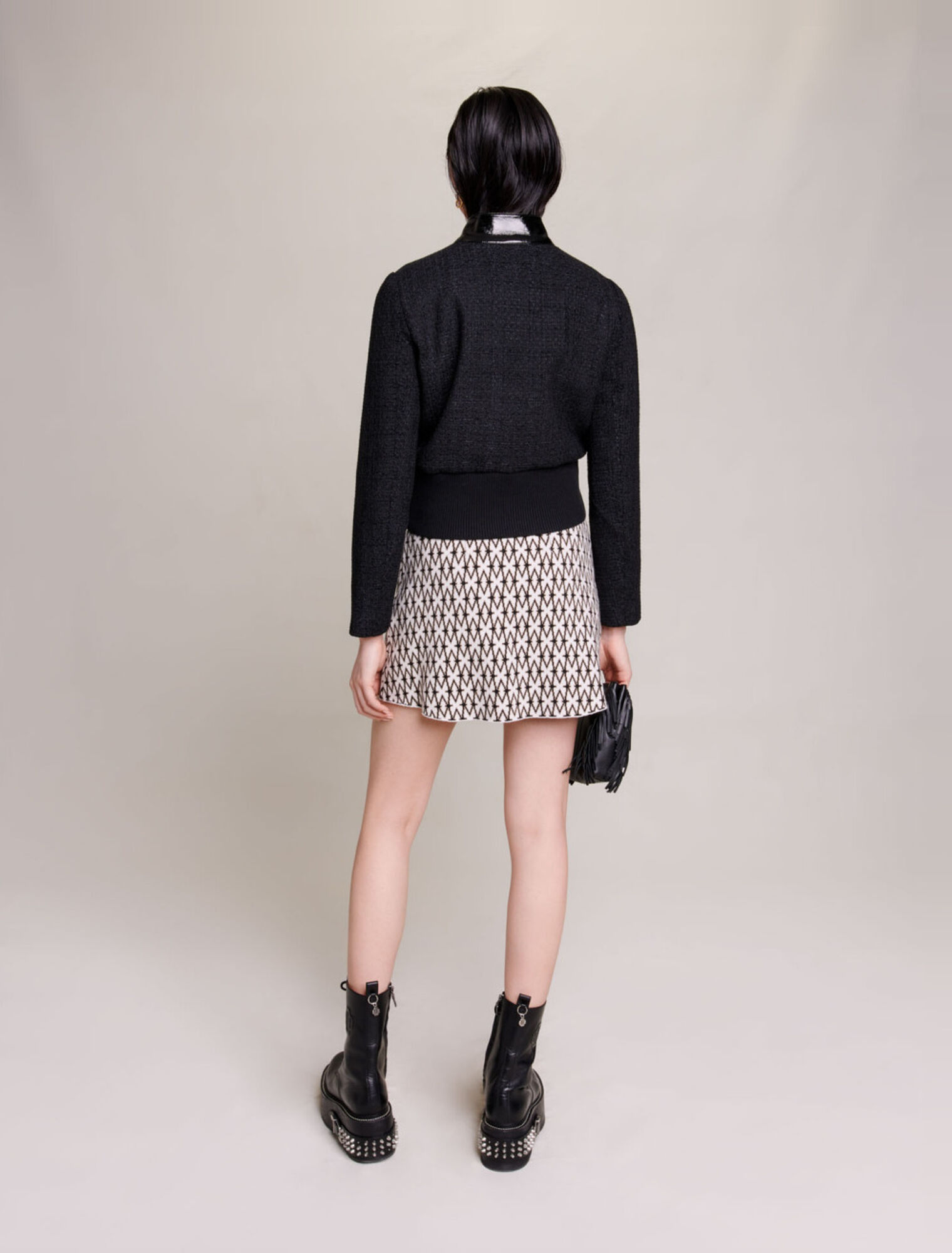 Cazadora de tweed y vinilo