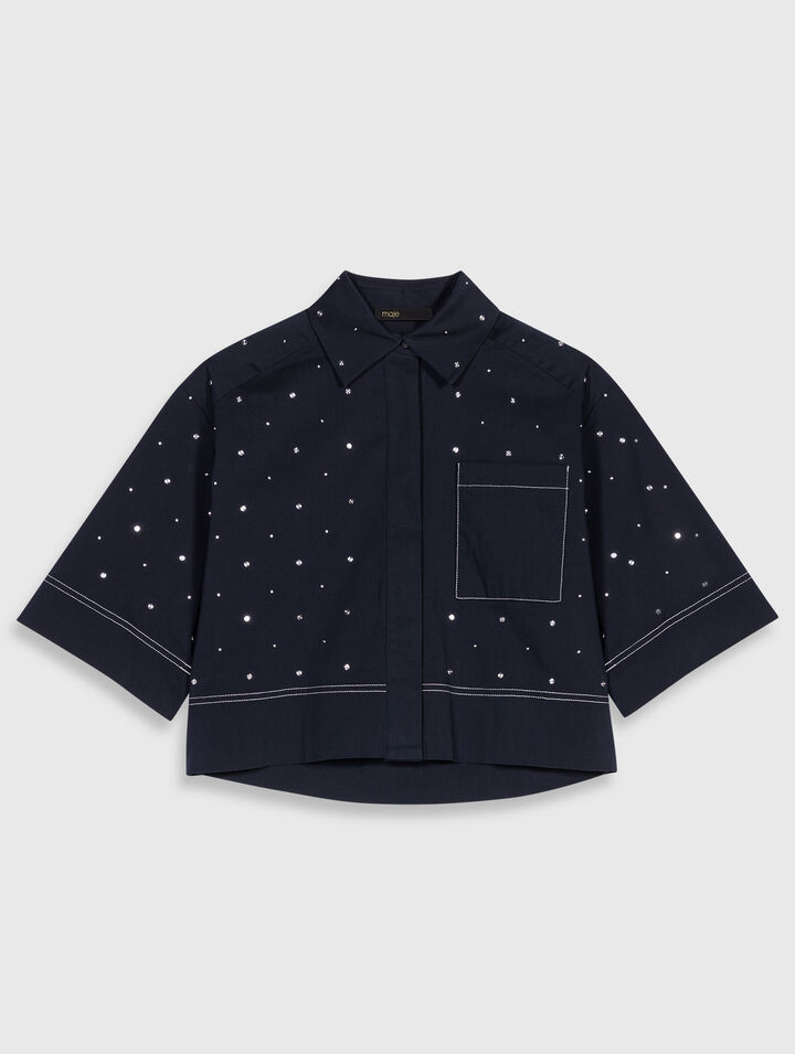 Camisa cropped con tachuelas