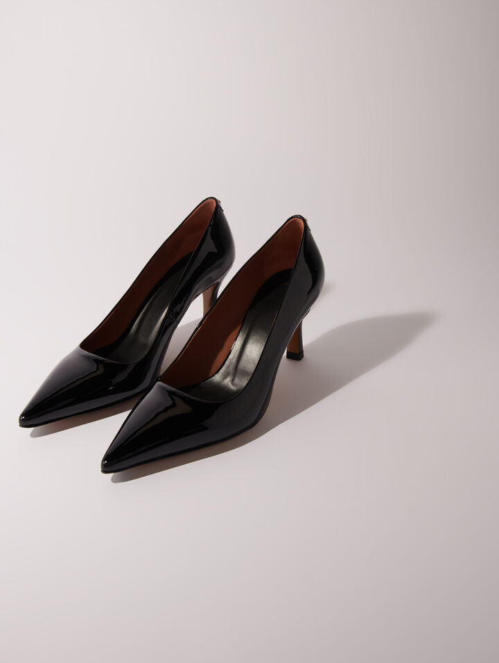 Tacones de punta fina de cuero