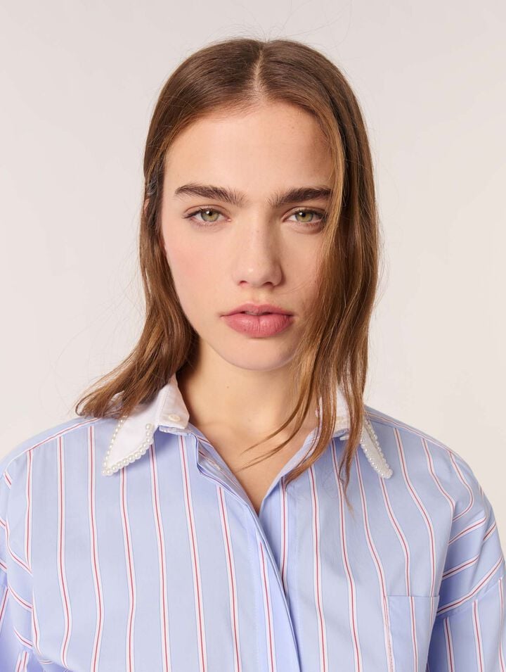 Camisa de rayas y cuello con cuentas
