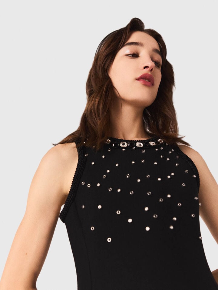 Vestido skater y detalles joya