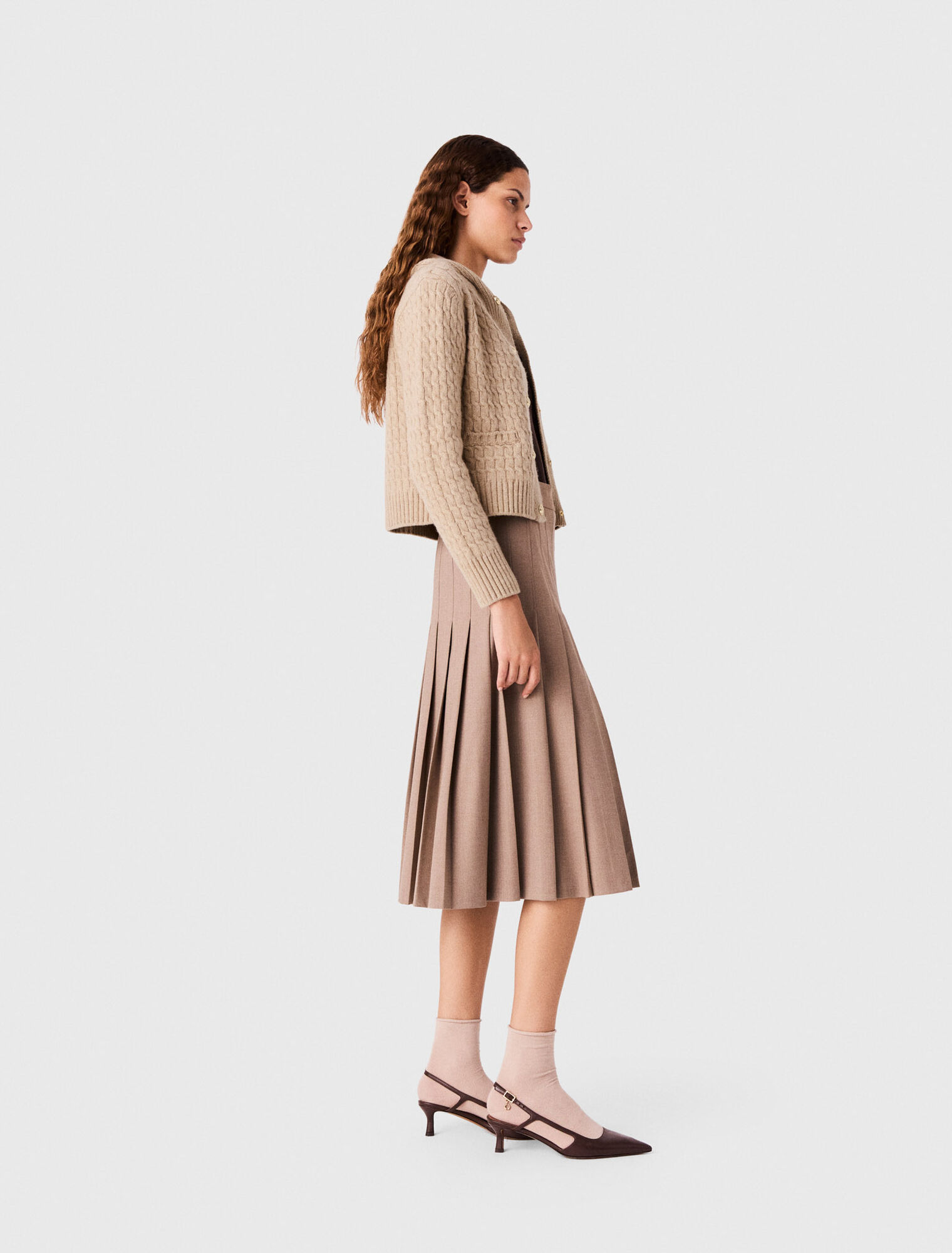 Falda midi plisada con hebillas