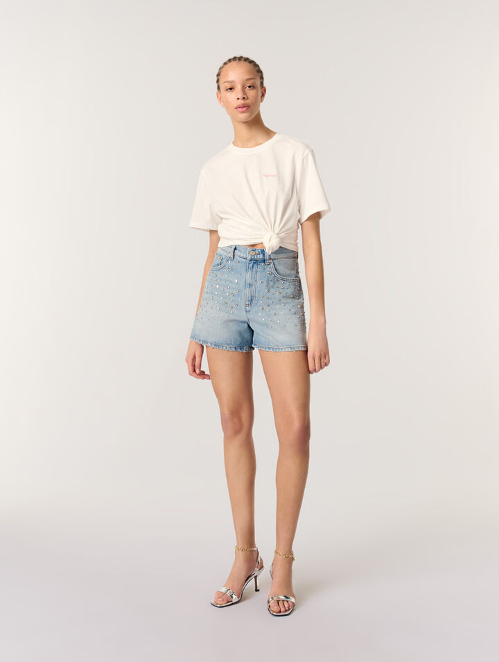 Pantalón corto vaquero con tachuelas
