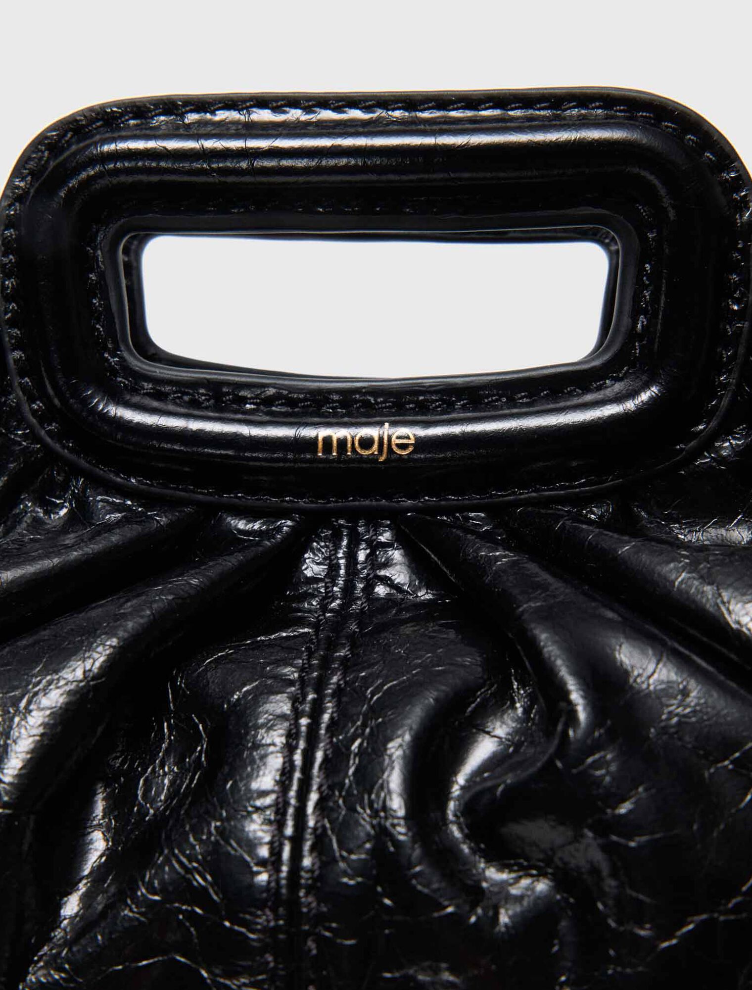 Mini clutch de cuero craquelado