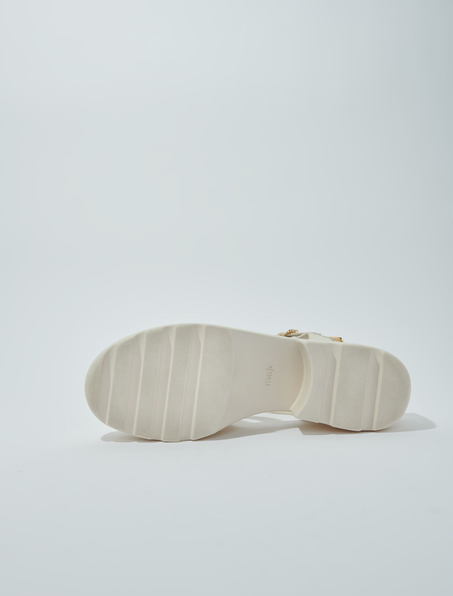 Sandalias de suela dentada en piel
