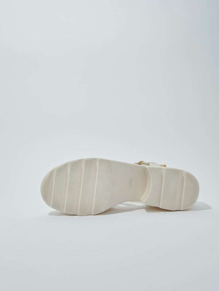 Sandalias de suela dentada en piel