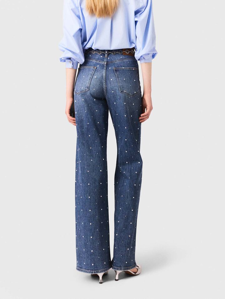 Vaquero ancho en denim con clavos