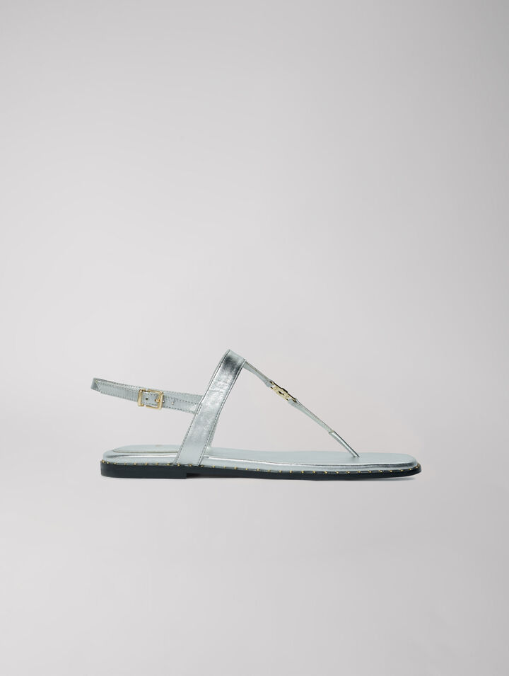 Sandalias con tiras de piel plateadas