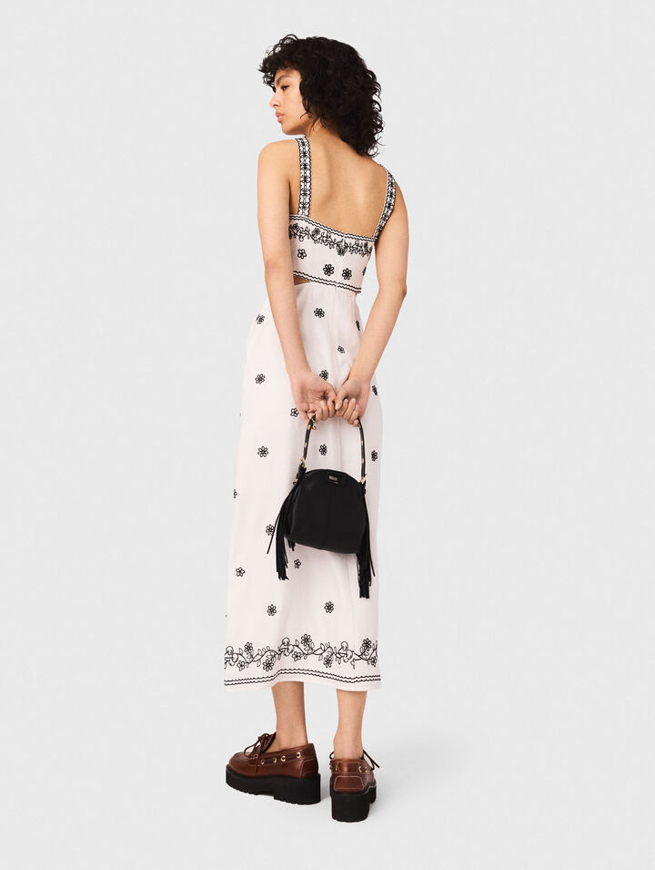 Vestido largo bordado con recortes