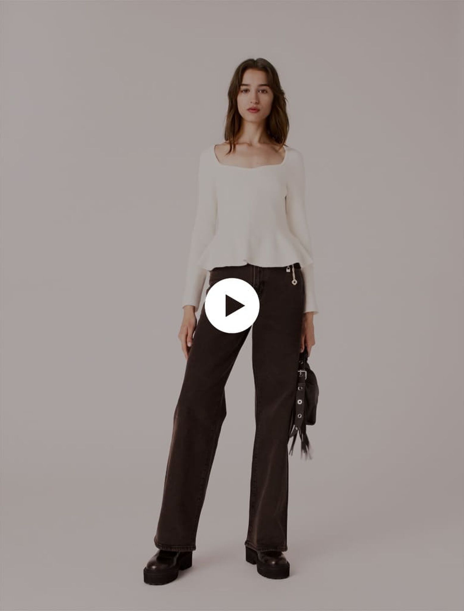 Vaquero bootcut con cadena