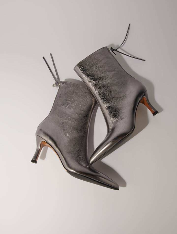 Botines con puntera metalizada
