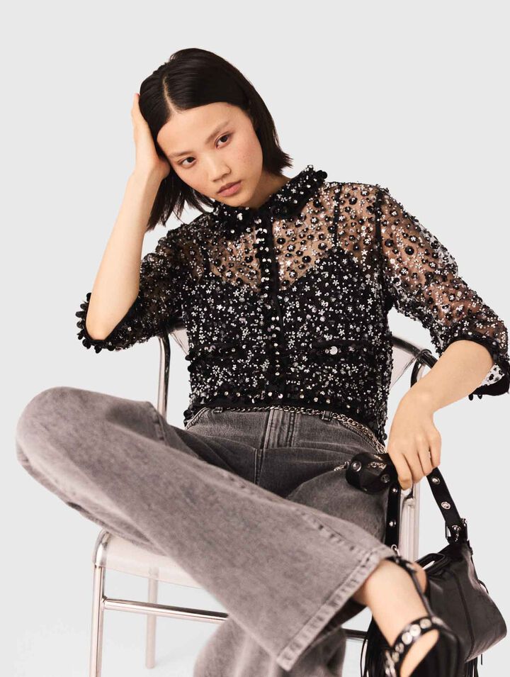 Polo con estampado floral y strass