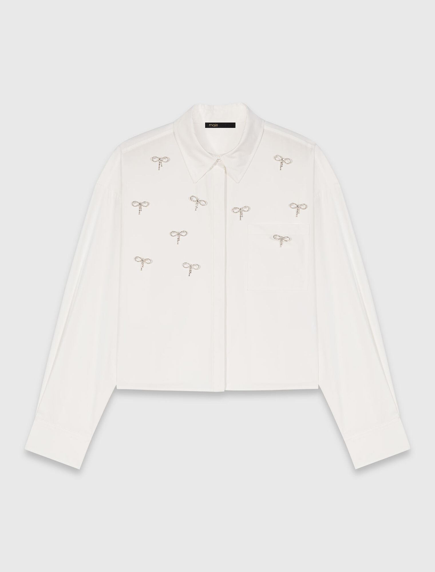 Camisa con detalles joya