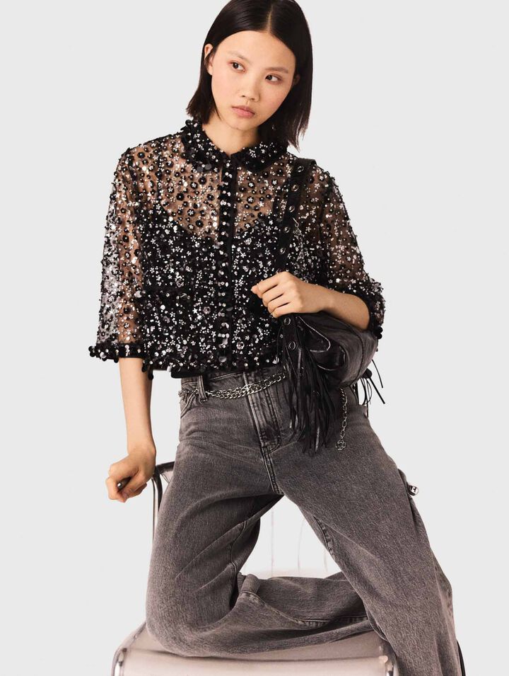 Polo con estampado floral y strass