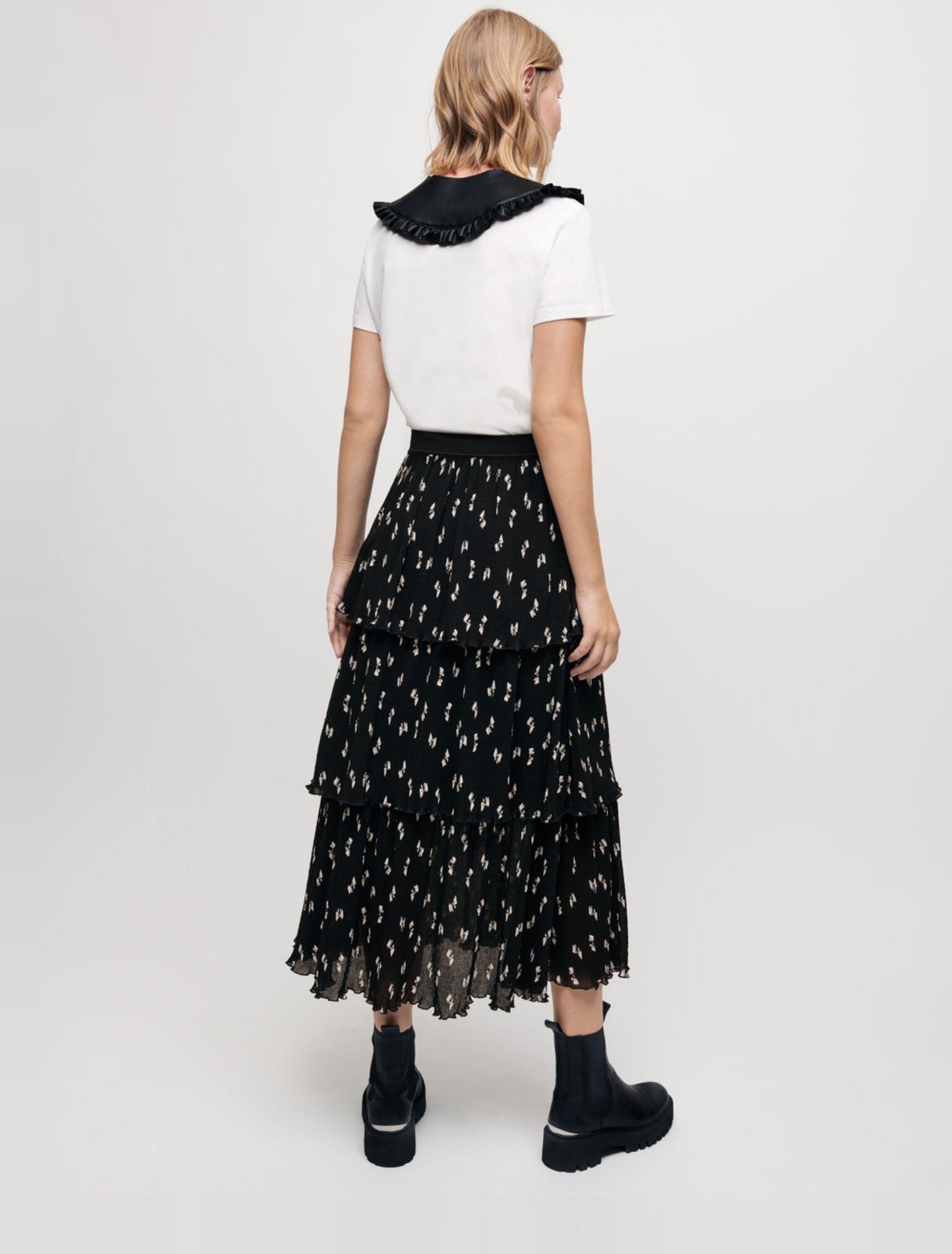 Minifalda plisada con estampado de lazos