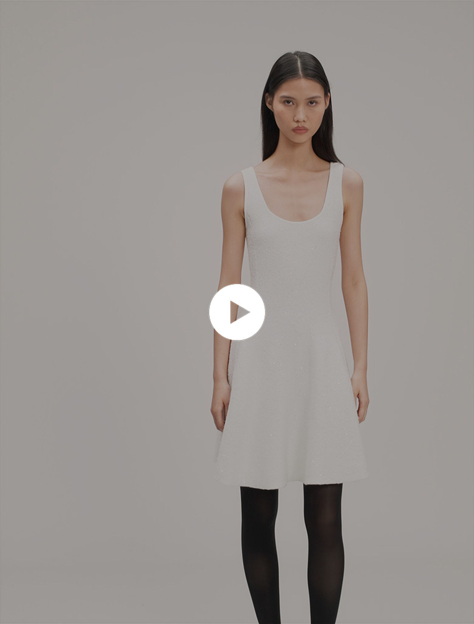 Vestido corto de punto y lentejuelas