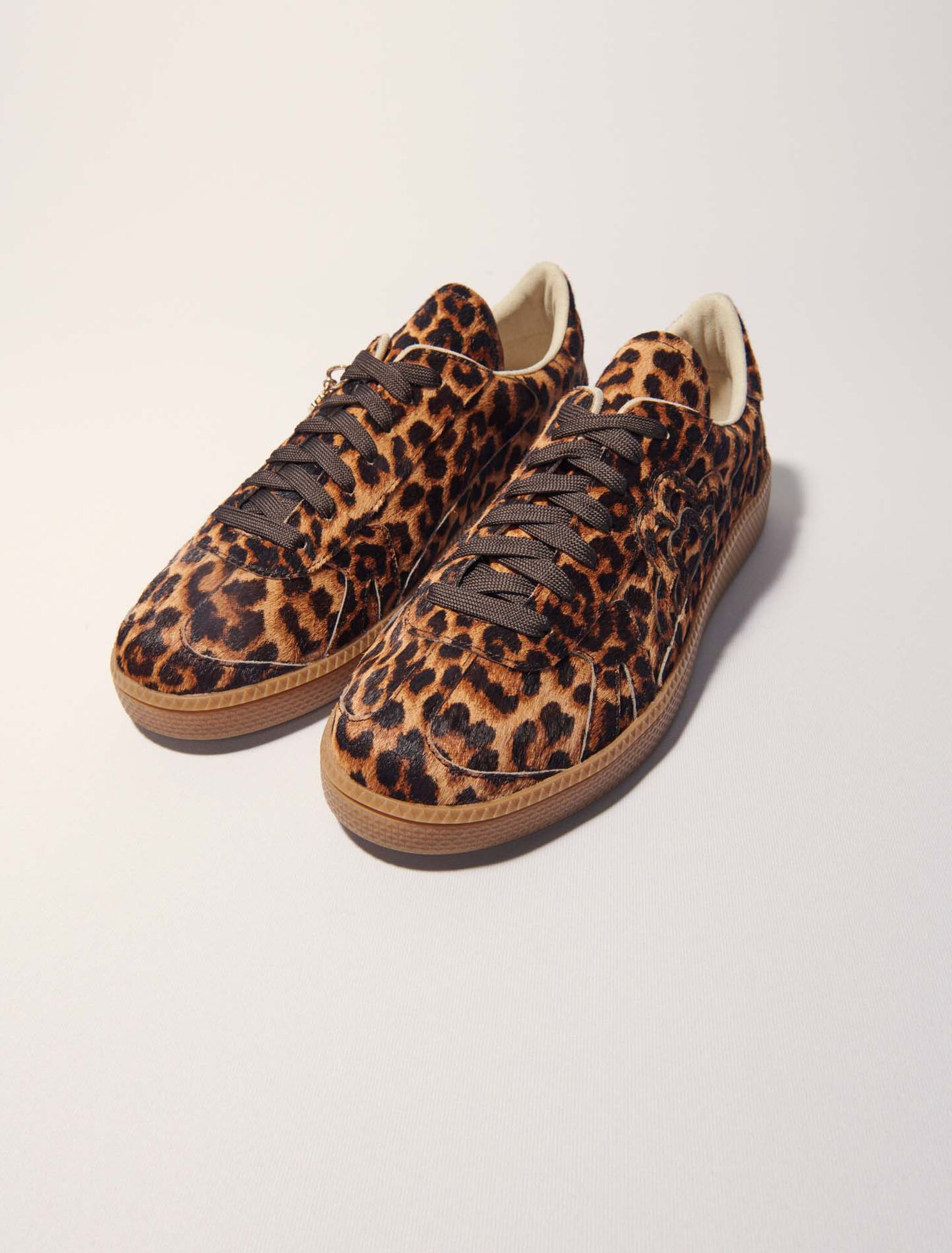 Zapatillas de piel con efecto leopardo