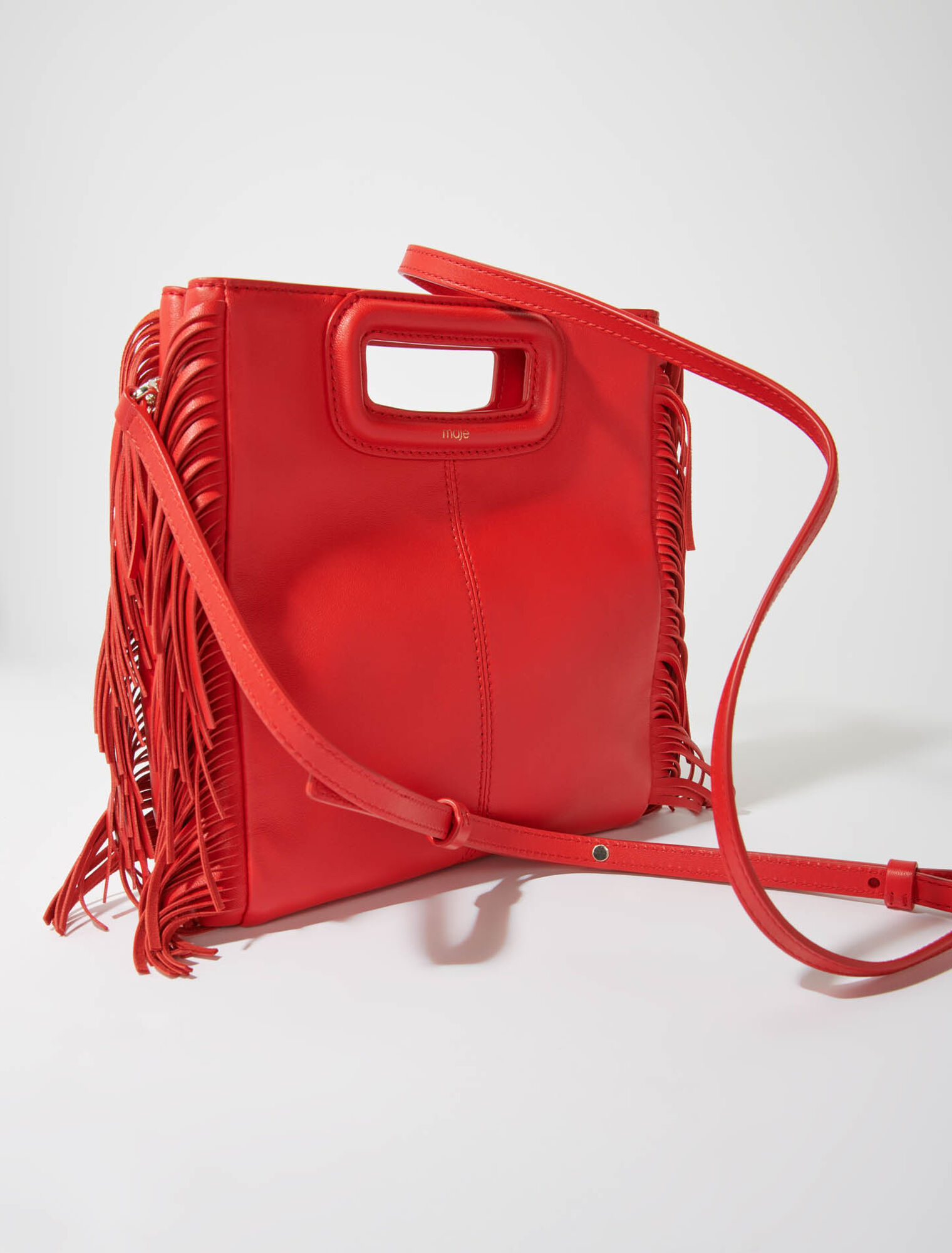 Bolso M con flecos de piel lisa