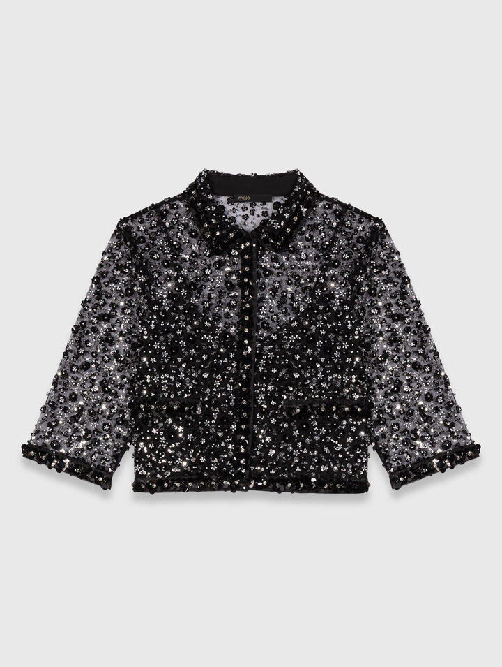 Polo con estampado floral y strass