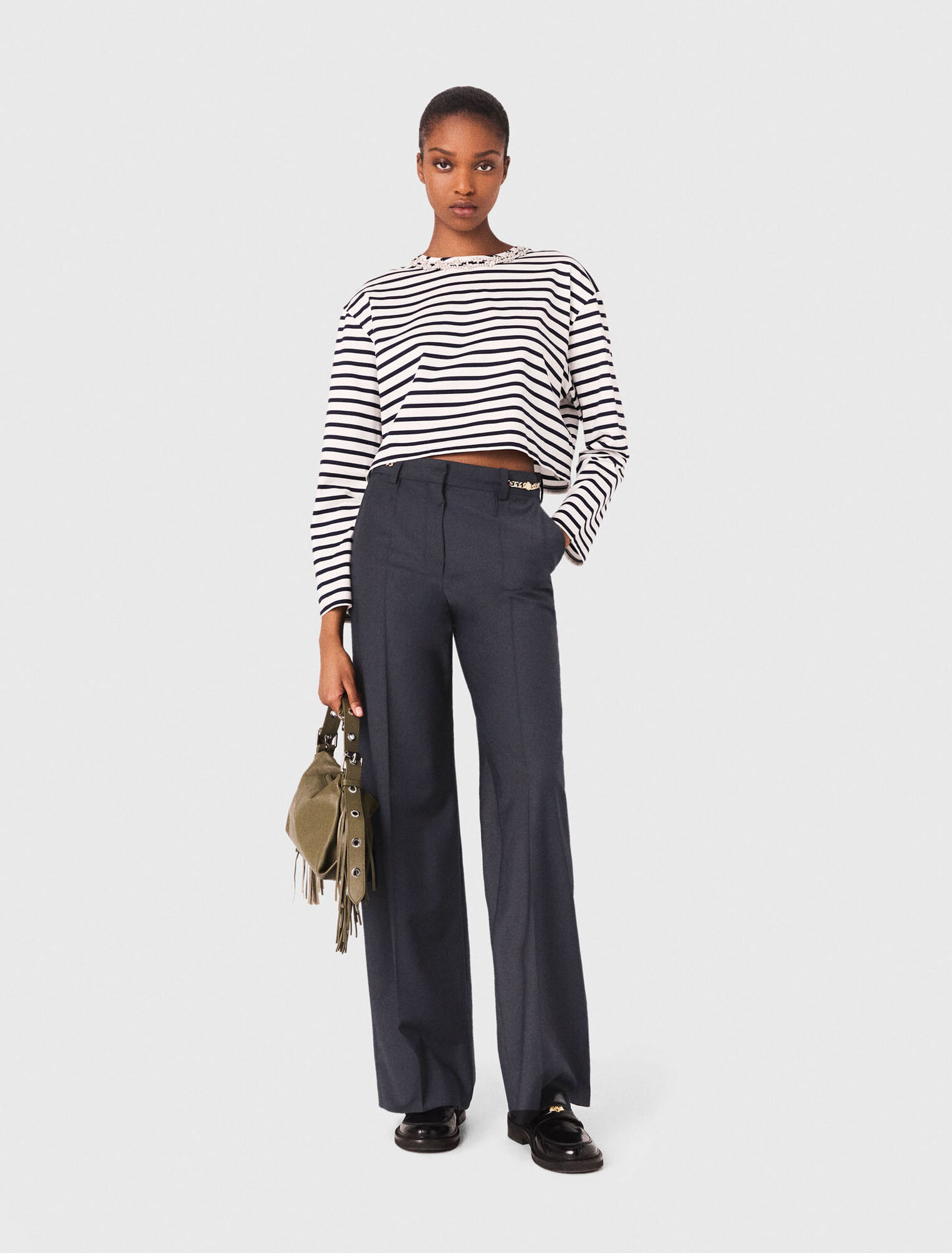 Pantalón sastre con detalles cadena