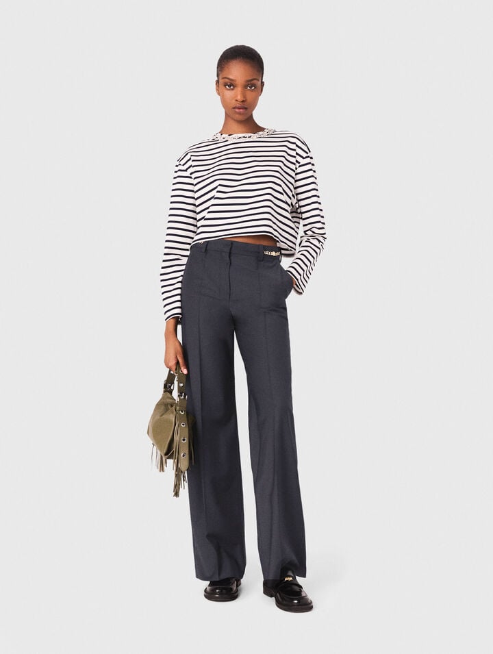 Pantalón sastre con detalles cadena