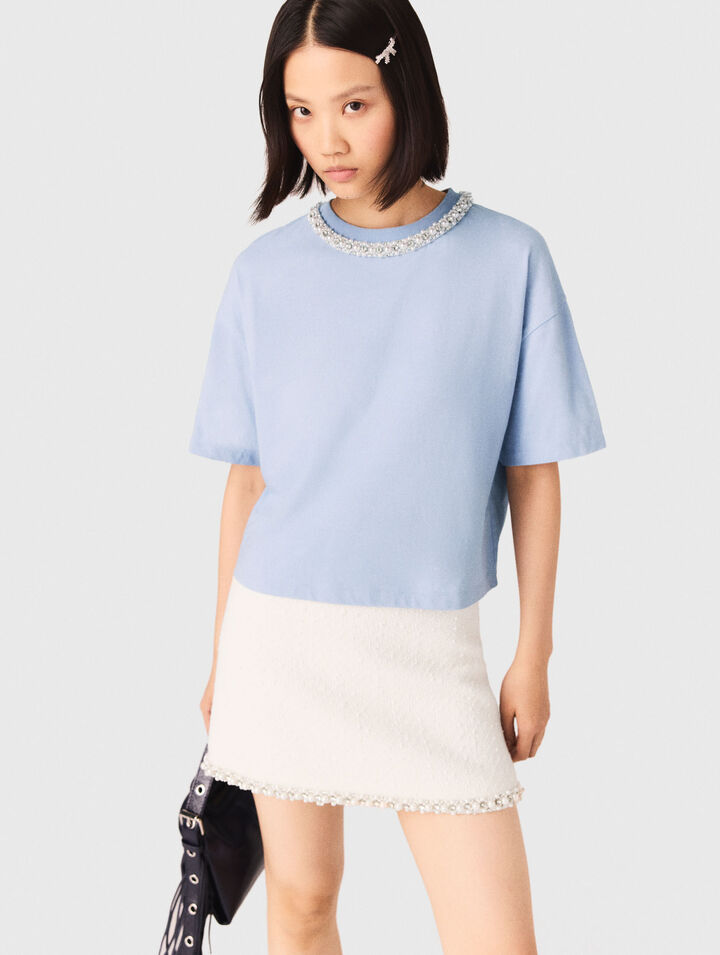 Camiseta con cuello joya