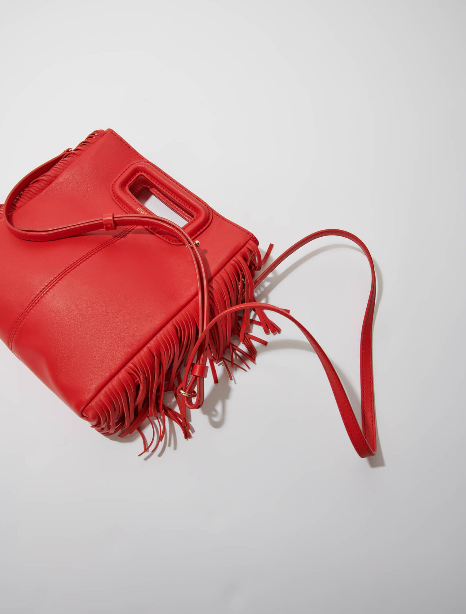 Bolso M con flecos de piel lisa