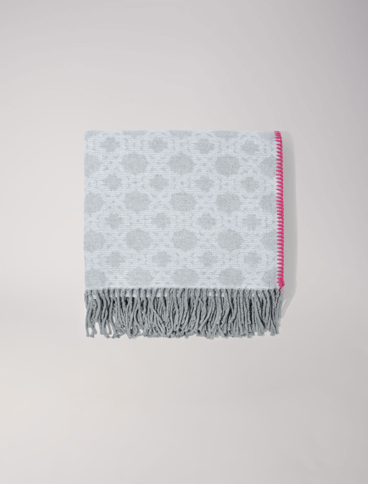 Poncho con monograma