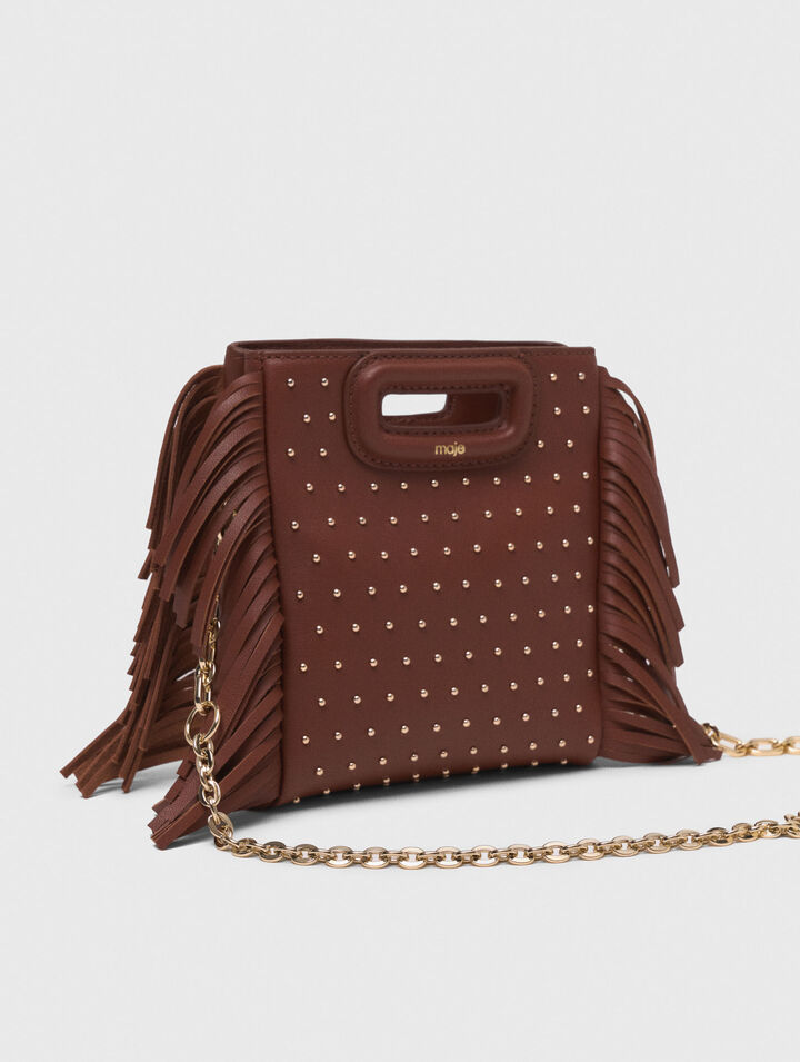 Bolso M mini de cuero y tachuelas