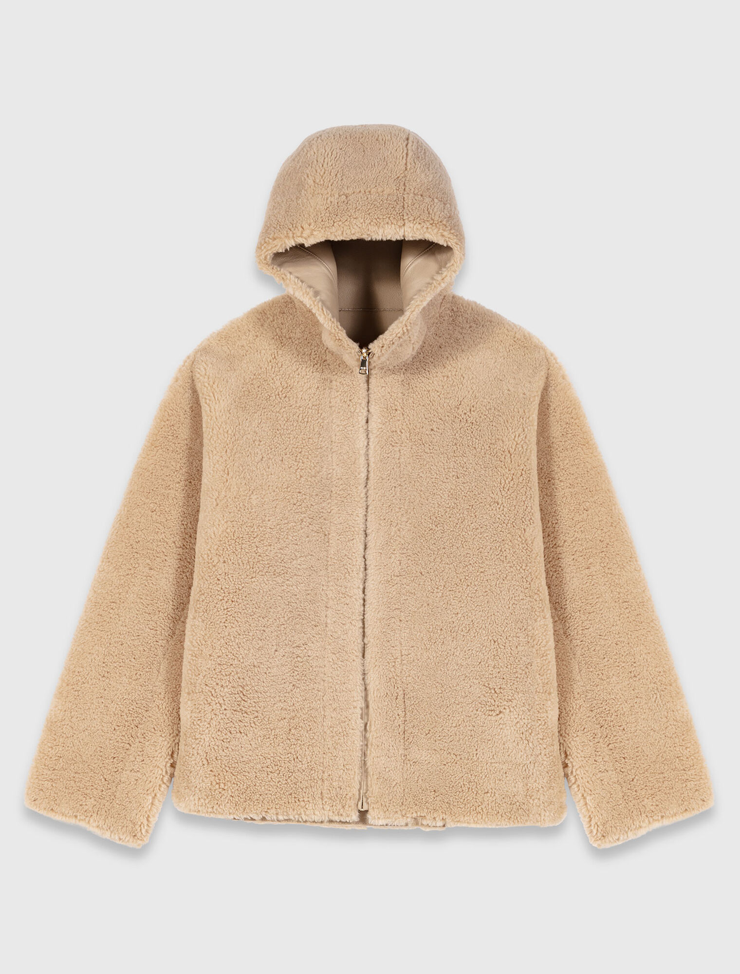 Abrigo reversible con capucha
