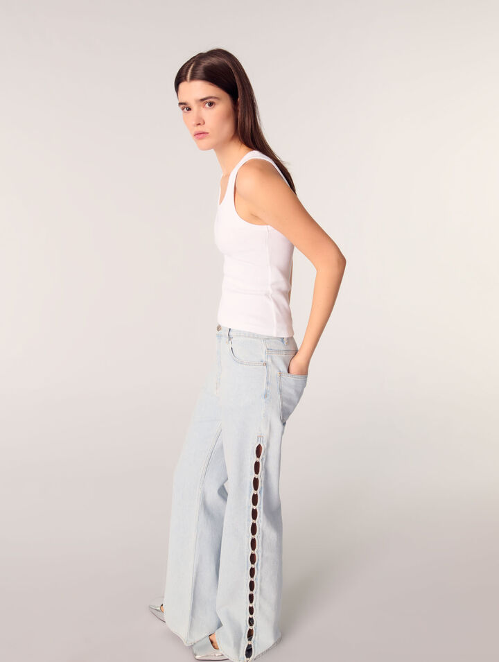 Pantalón vaquero abierto y detalles