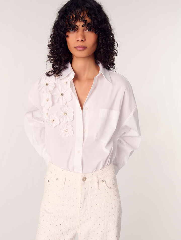Camisa larga con flores bordadas