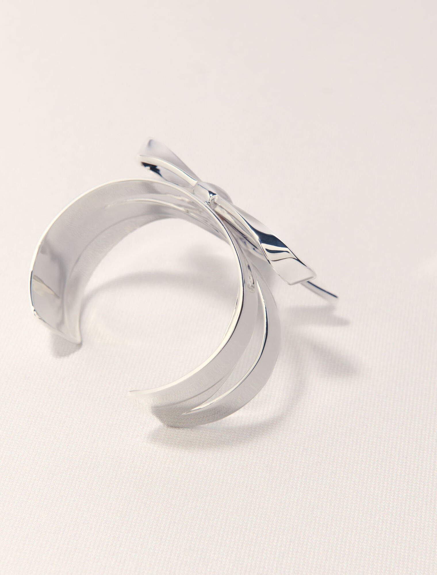 Brazalete lazo plateado