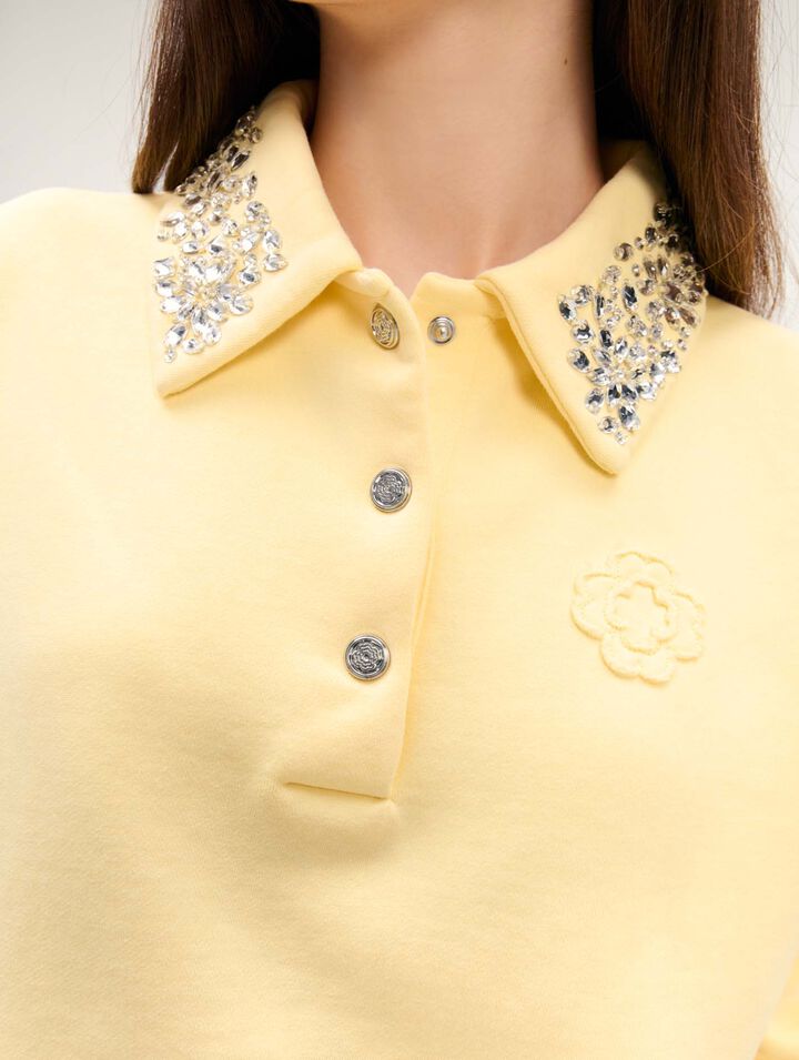 Sudadera corta con cuello joya