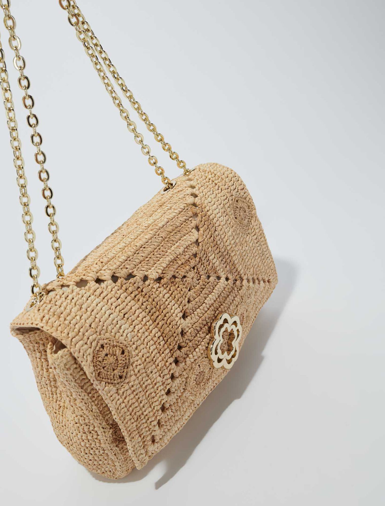 Bolso clover de rafia hecho a mano