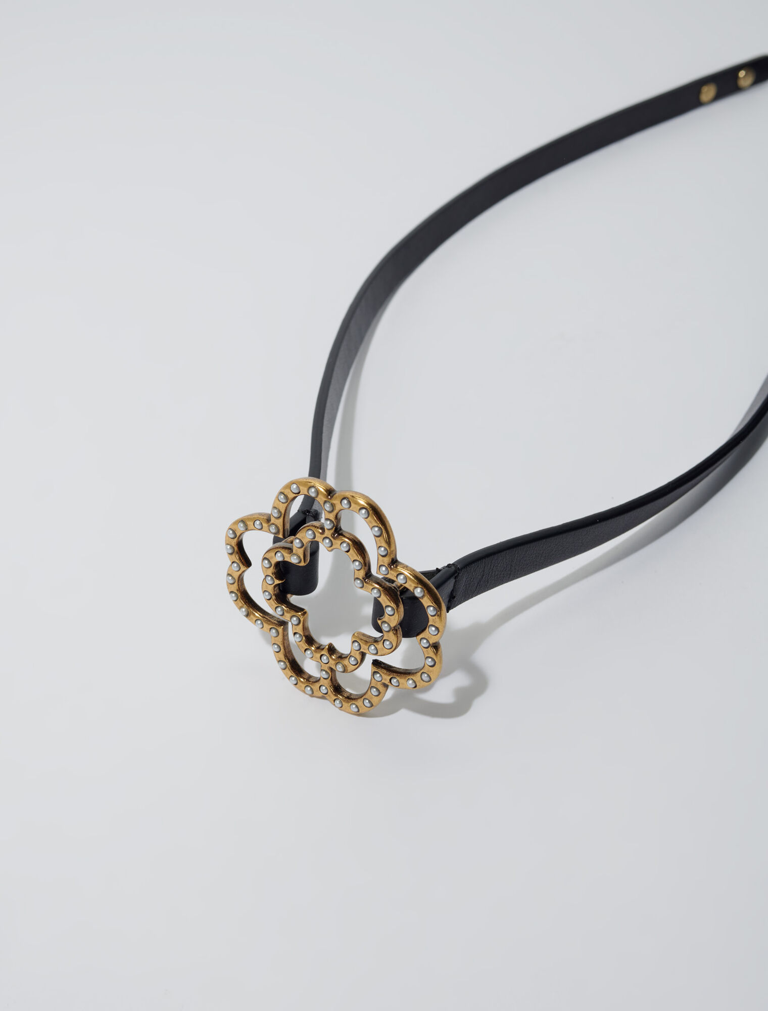 Cinturón con trébol de perlas