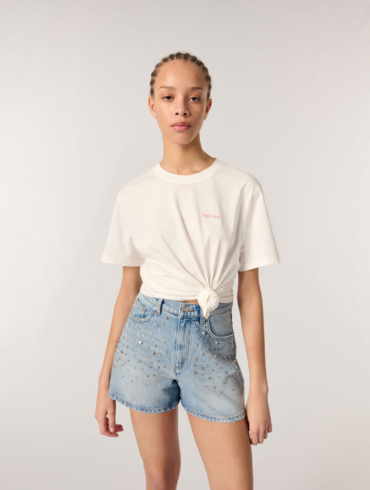 Pantalón corto vaquero con tachuelas