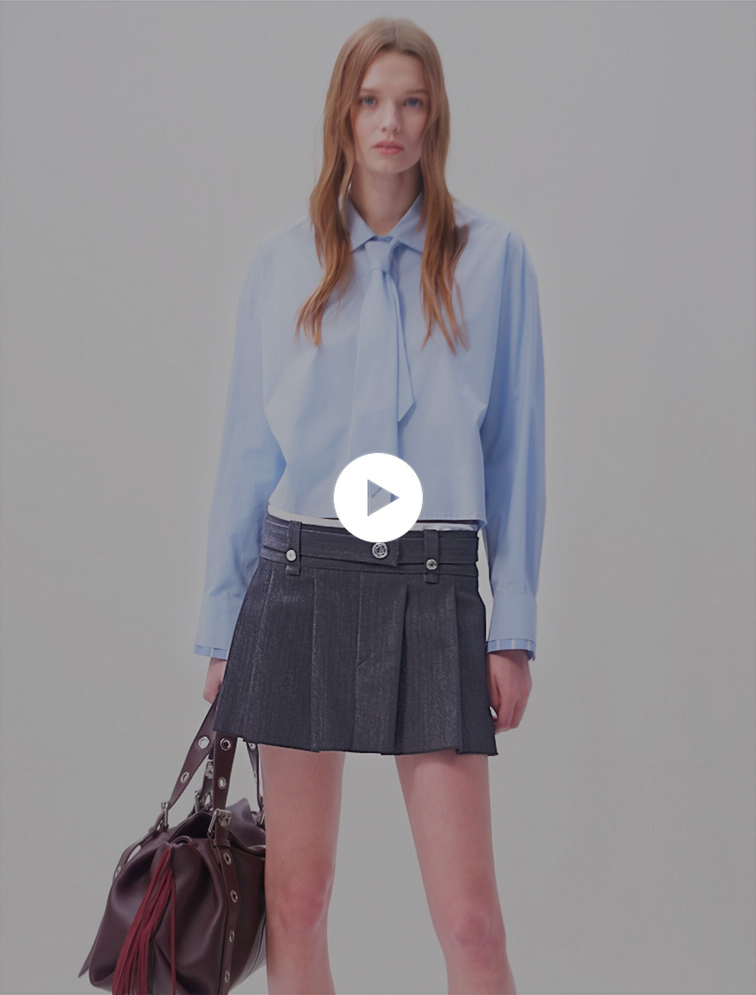 Minifalda negra efecto denim