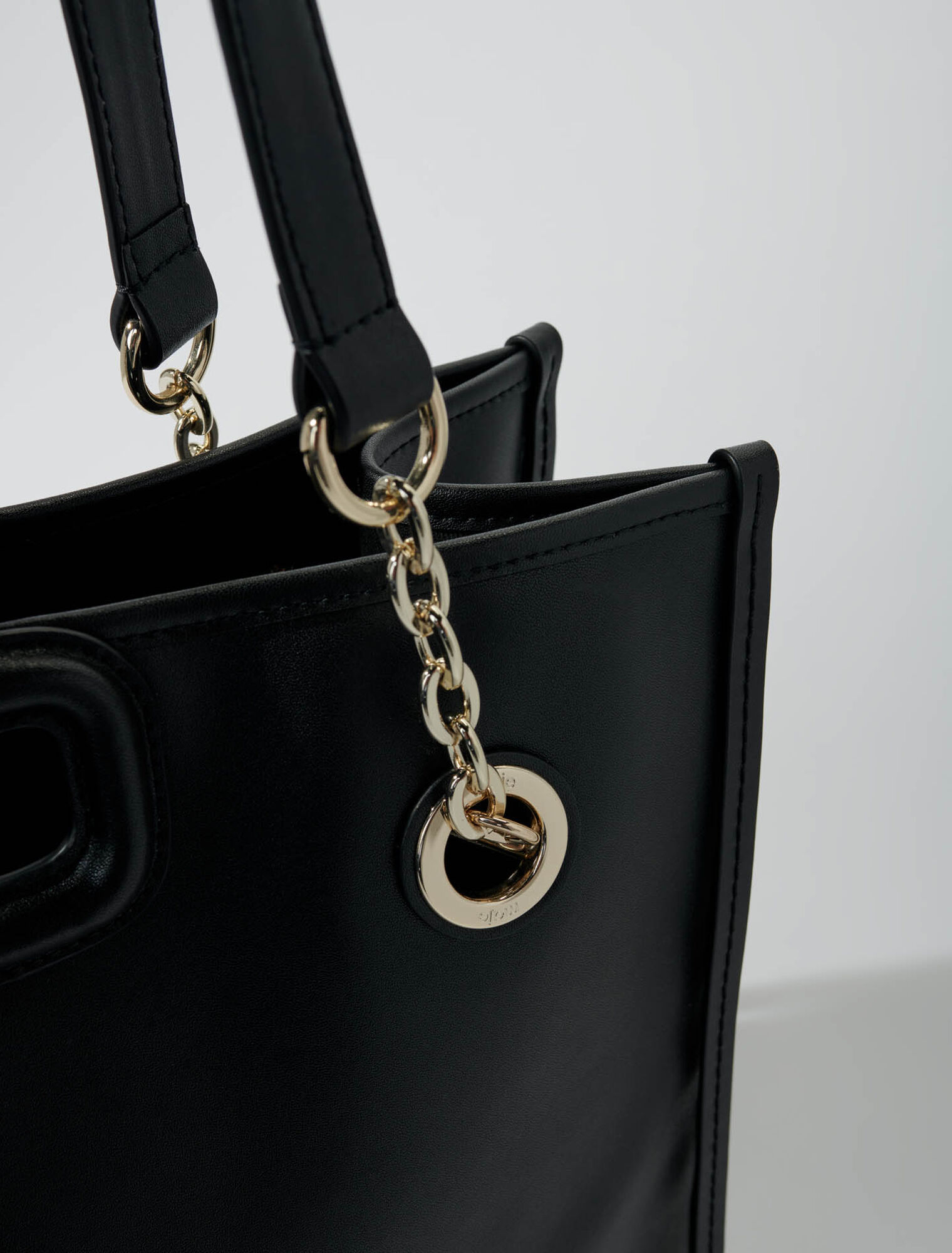 Bolso cabás de cuero con flecos