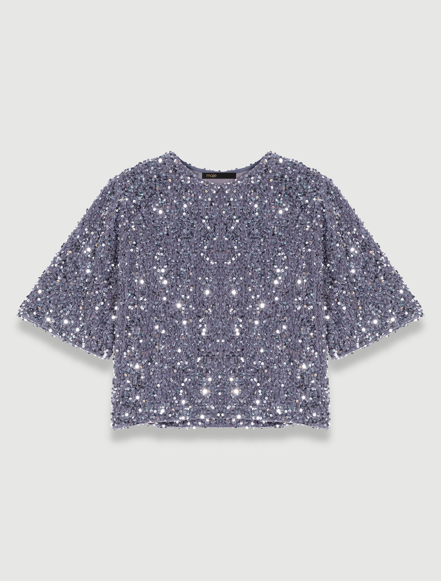 Top de terciopelo y lentejuelas
