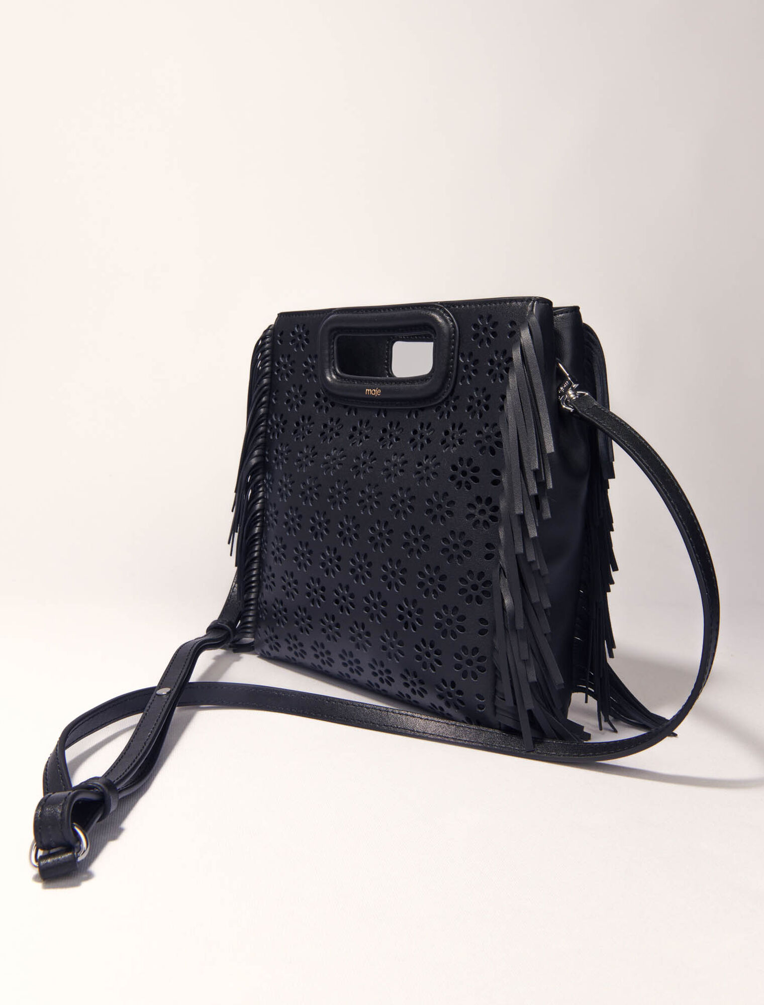 Bolso M de piel perforada