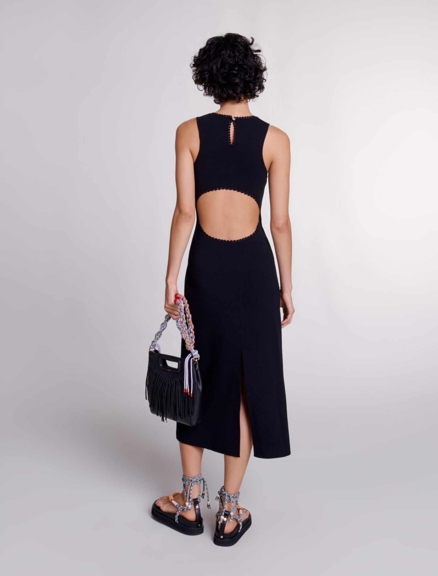 Vestido largo de punto con recortes