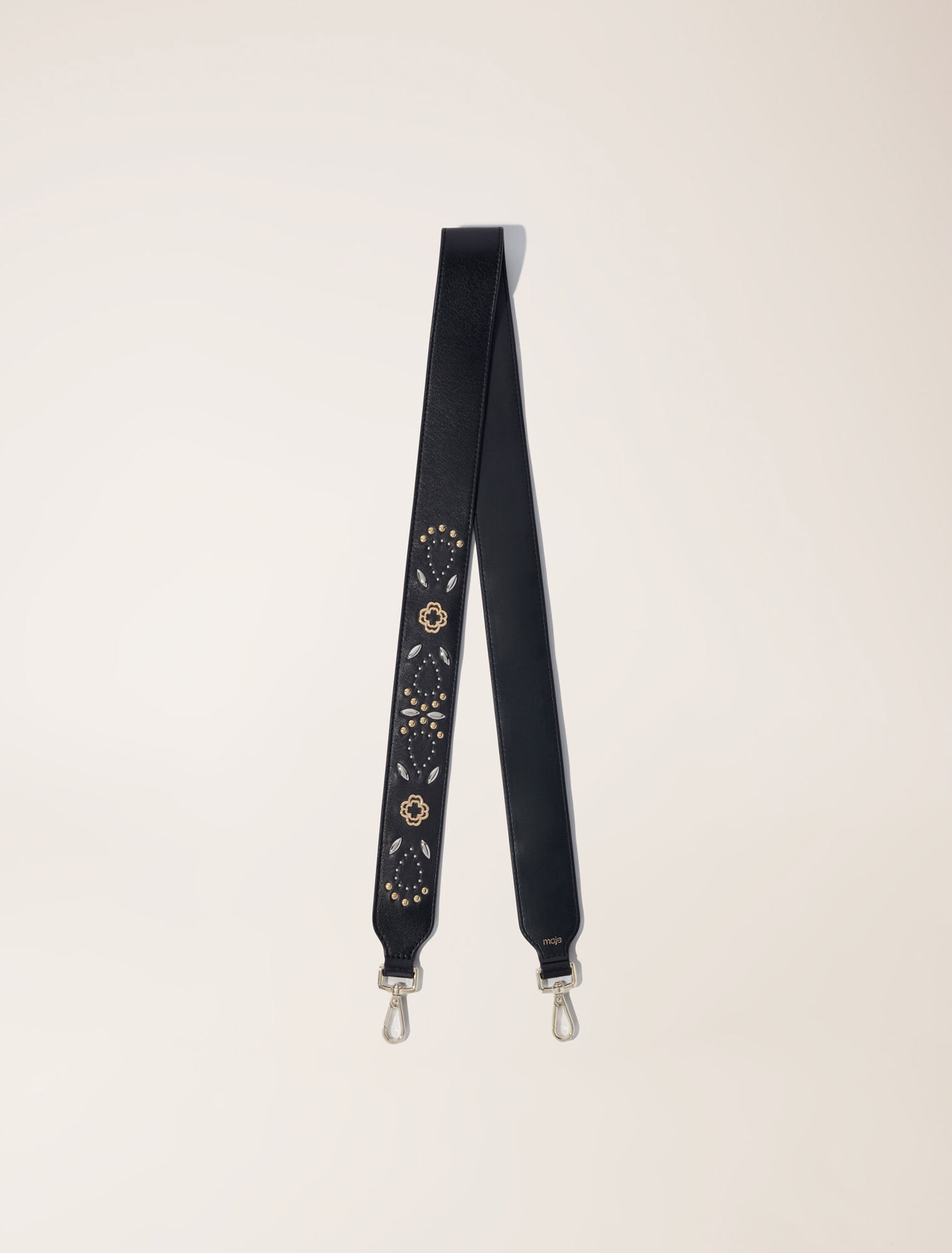Bandolera de cuero con tachuelas