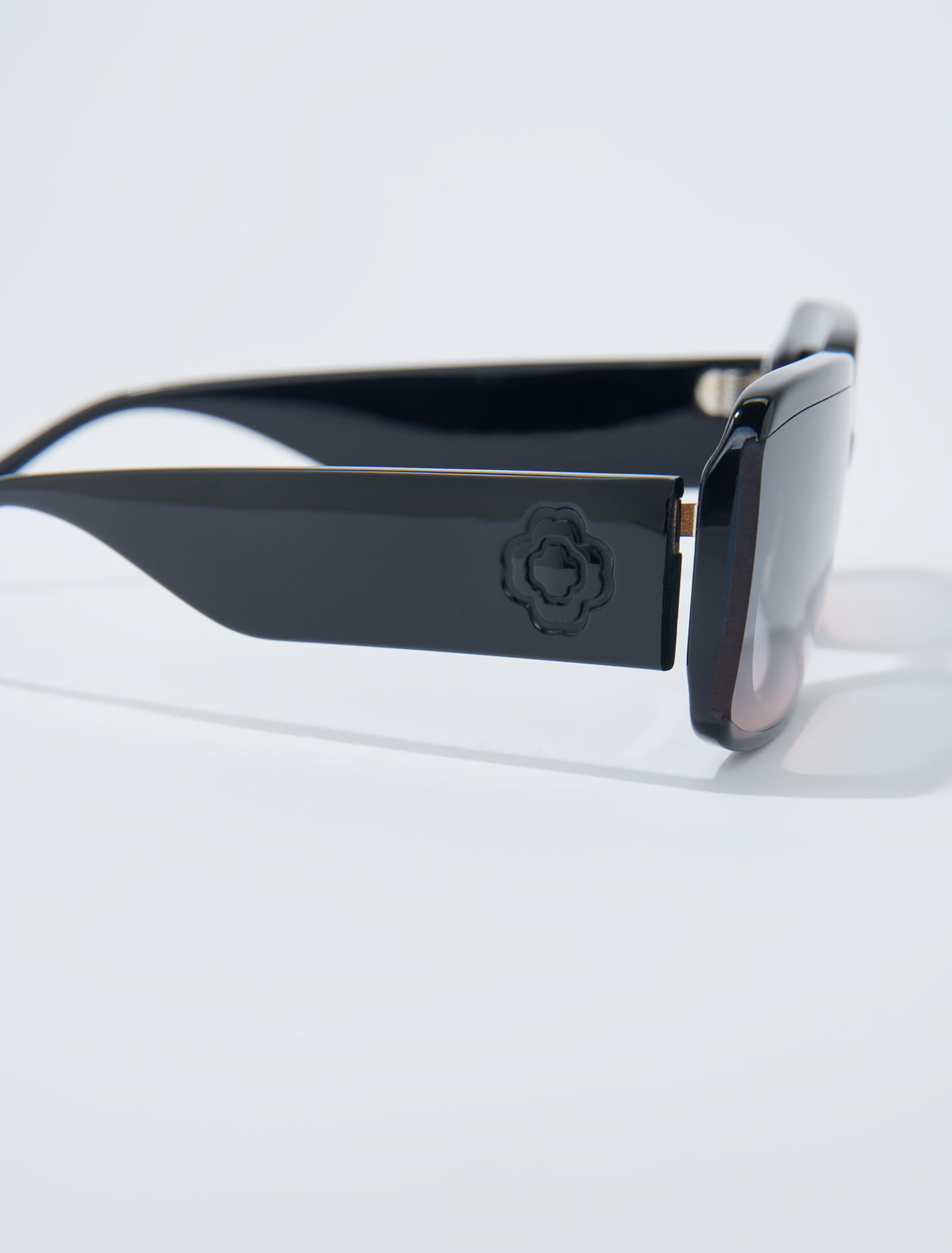 Gafas de acetato y lentes ahumadas