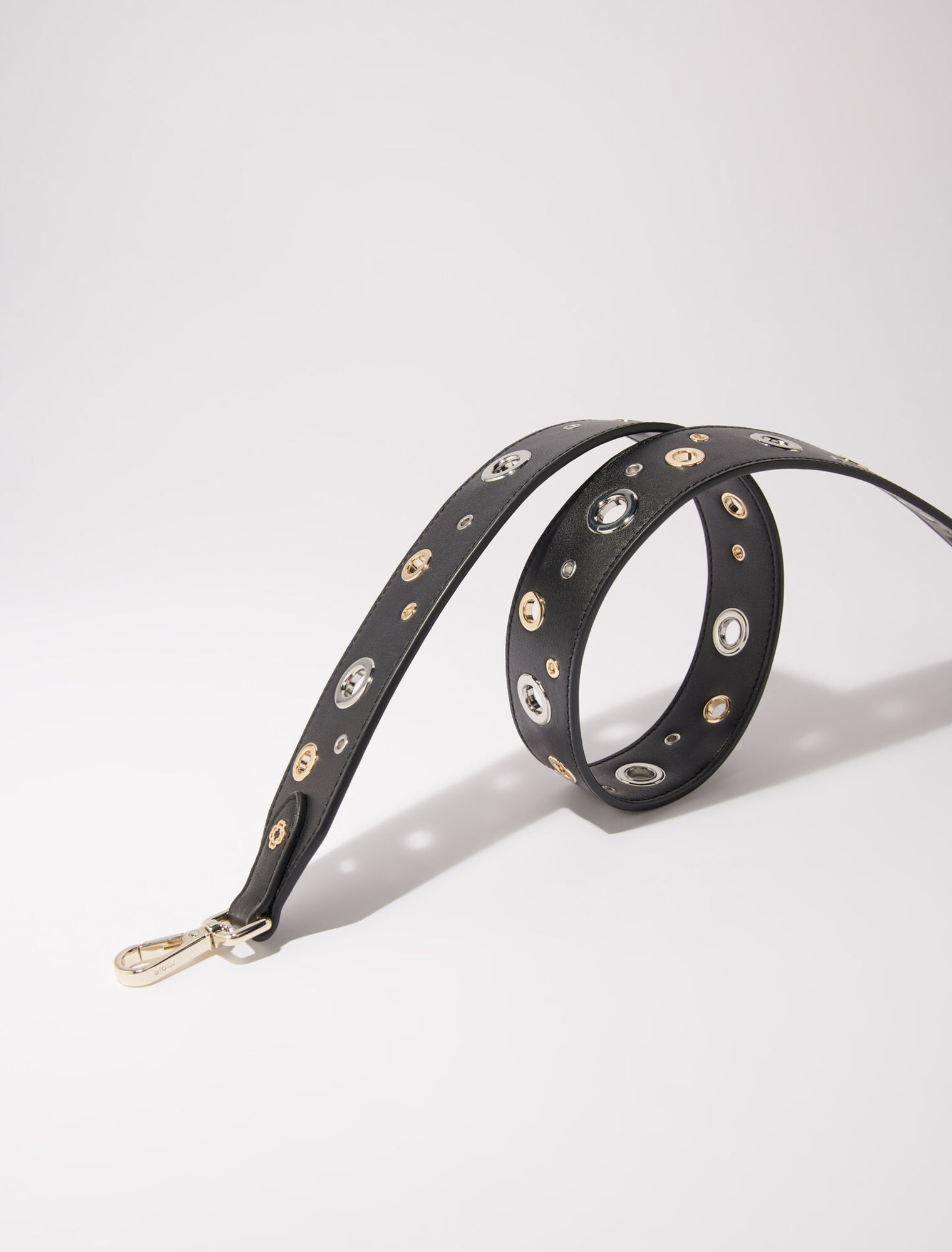 Bandolera de cuero y ojales