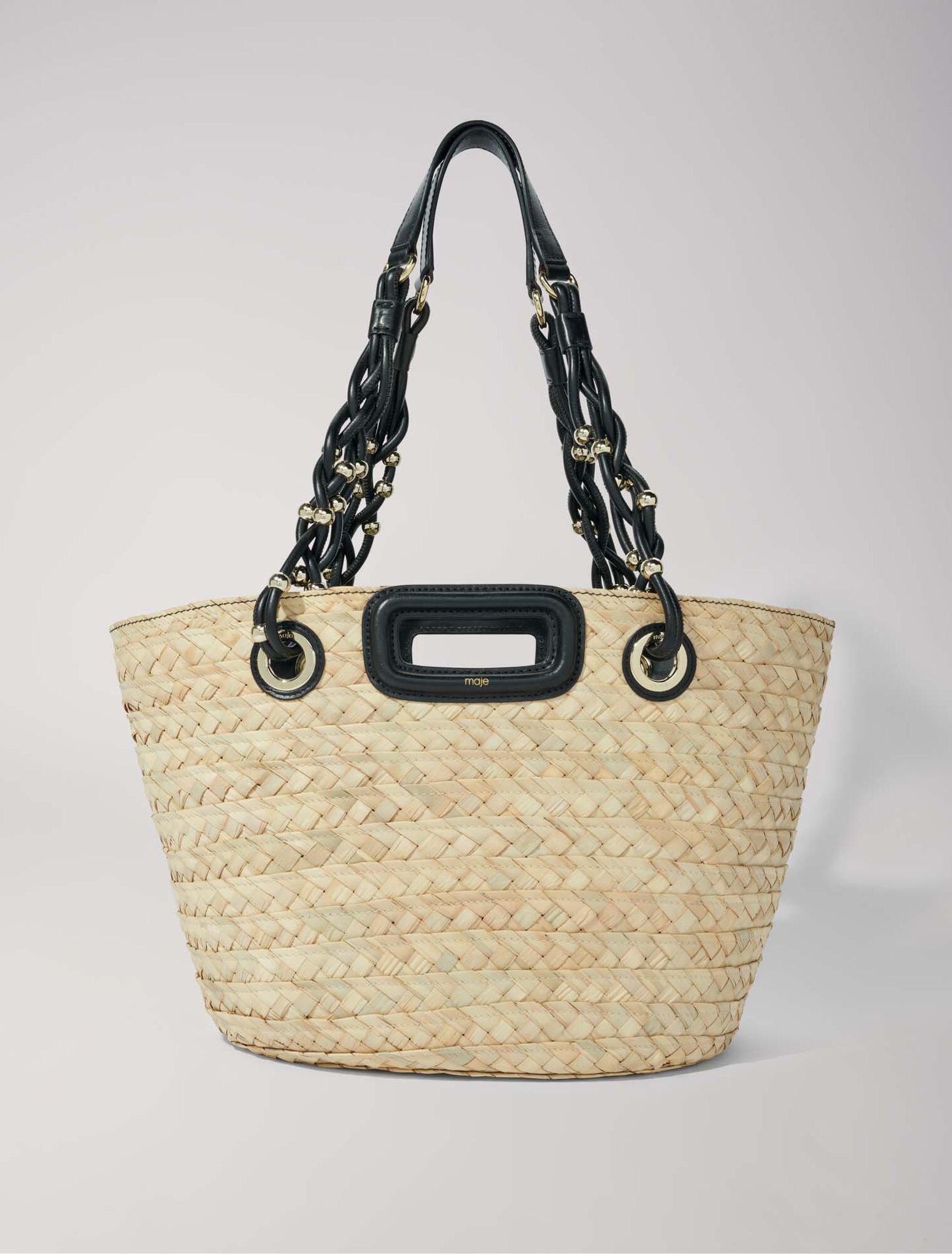 Cesta trenzada de rafia