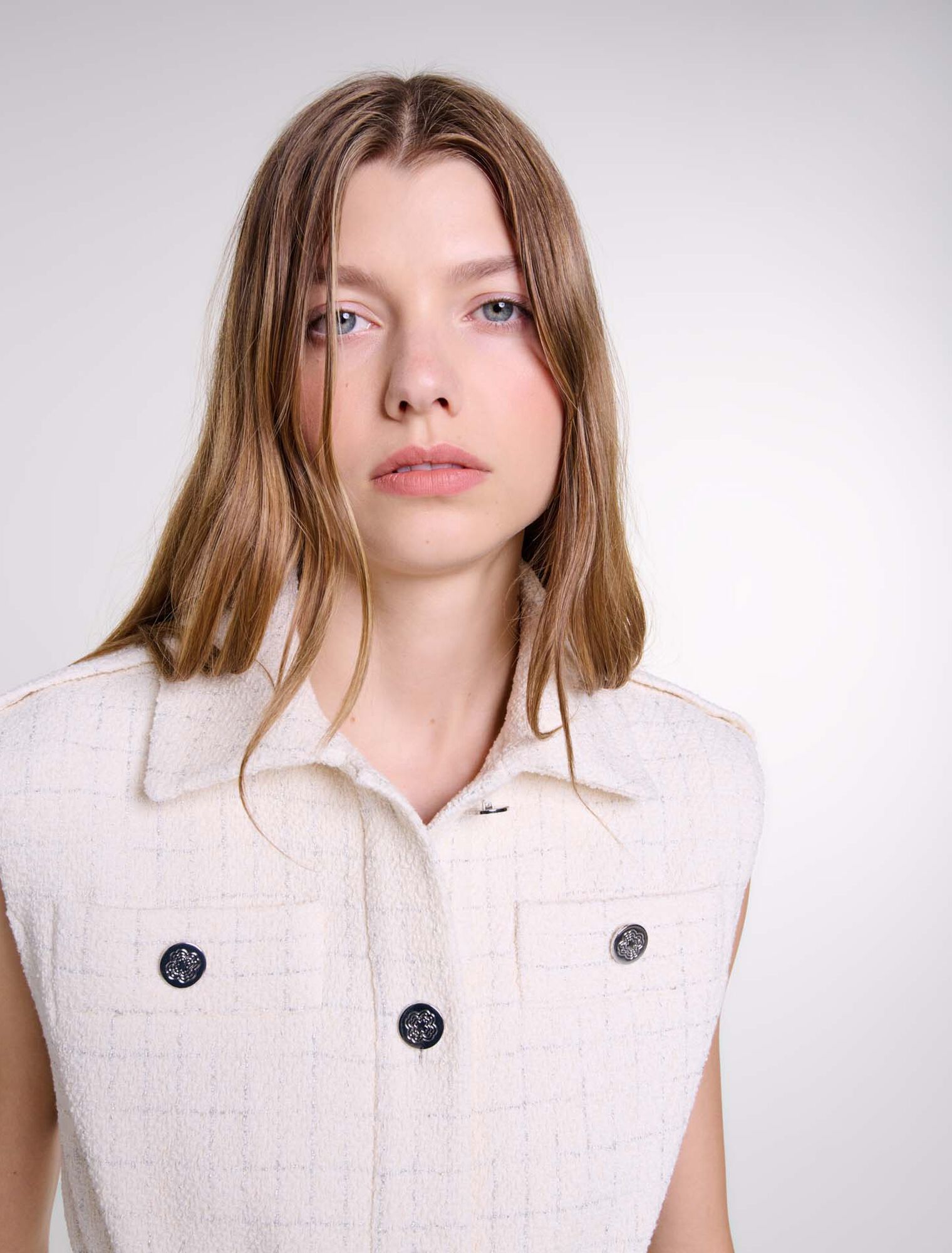 Chaqueta de tweed sin mangas