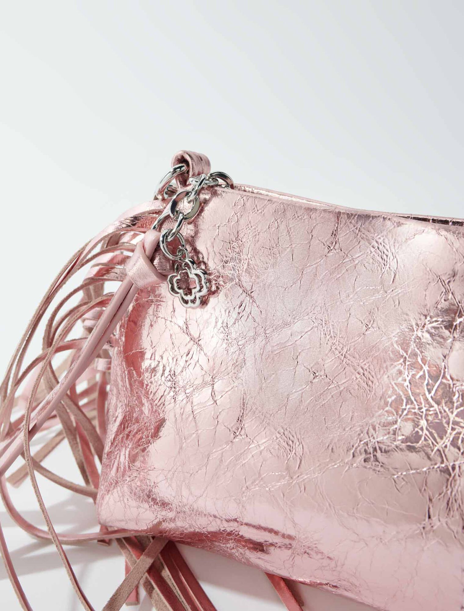 Bolso Miss M pouch piel metalizada