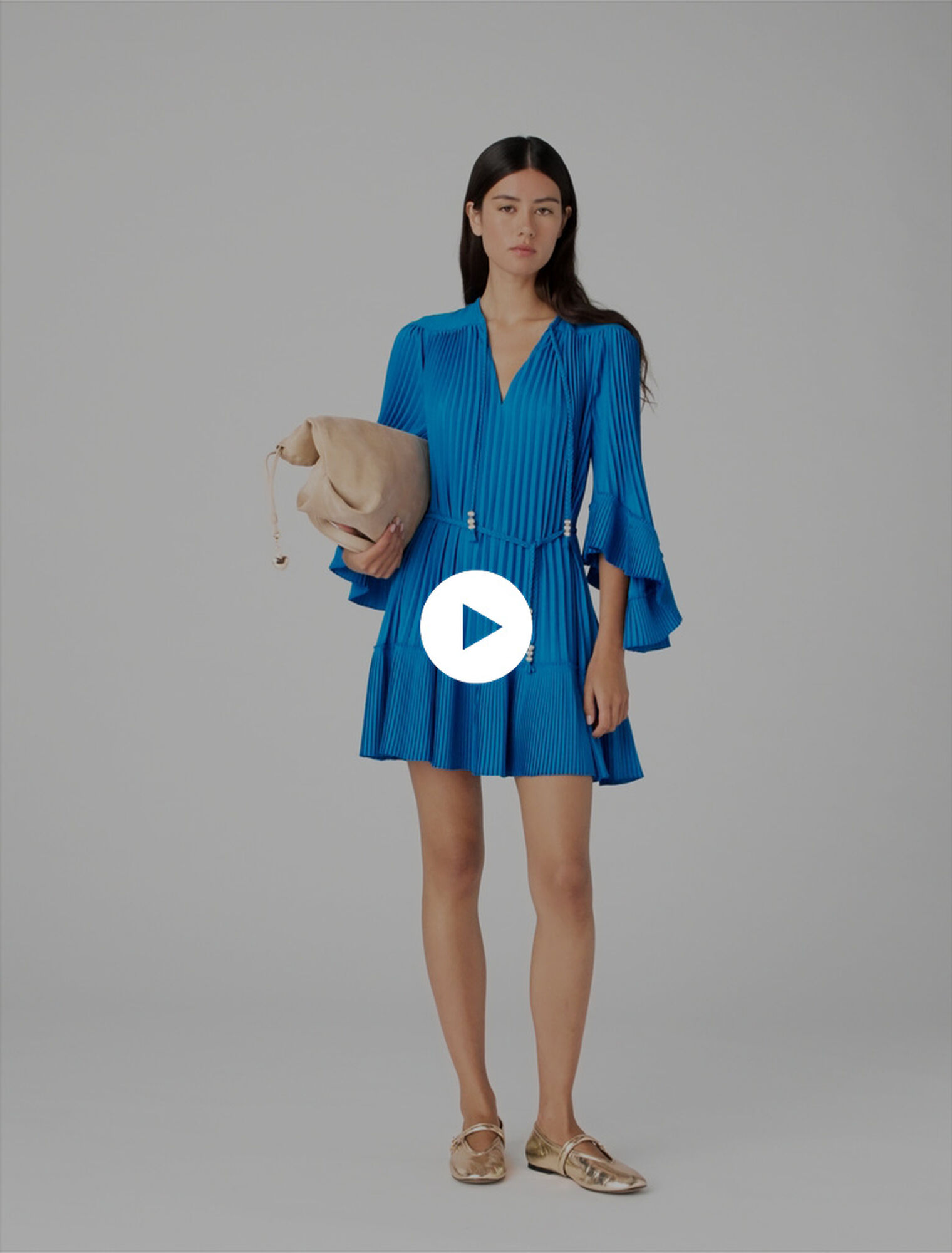 Vestido corto plisado