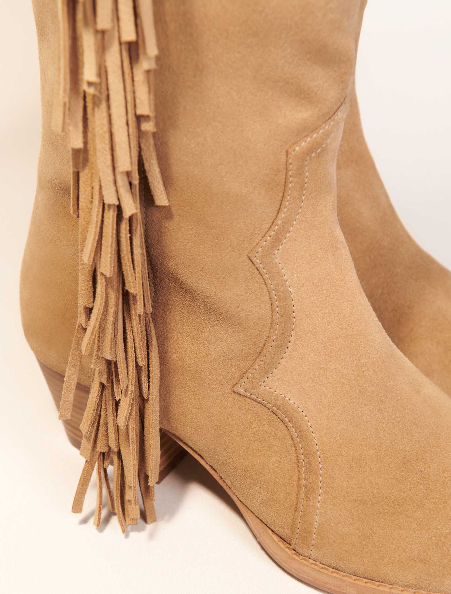 Botas de vaquero de ante con flecos